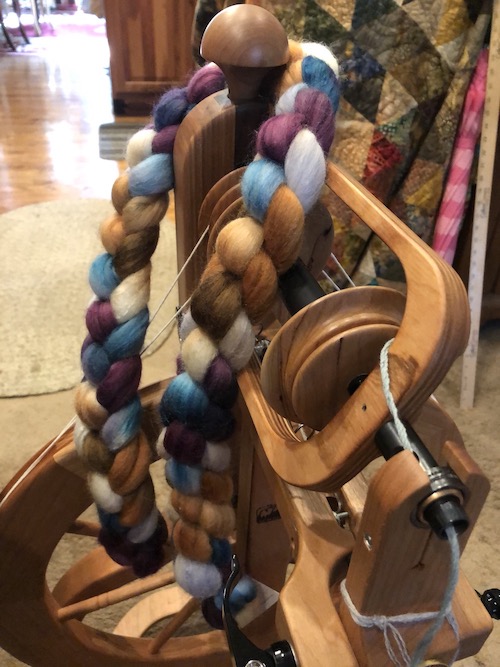 spinning wheel with braid